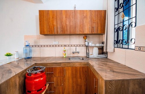 Gede Apartment | Cozy Kitra Homes: A Comfortable Studio Retreat for Families