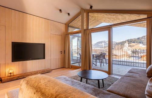 Oberndorf bei Kitzbuhel Apartment | Elegant Kitzbühel Suites with Spa & Child-Friendly Amenities
