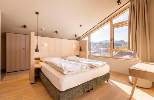 Oberndorf bei Kitzbuhel Apartment | Elegant Kitzbühel Suites with Spa & Child-Friendly Amenities