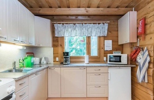 Mantyharju House | Relaxing Retreat at Kivilöytö by Interhome with Lake View
