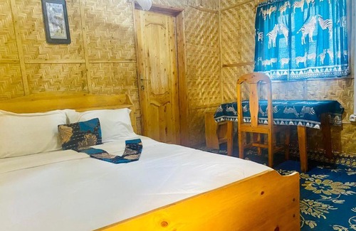 Kibuye Cabin | Eco-Friendly Kivu Macheo Lodge with Family Amenities