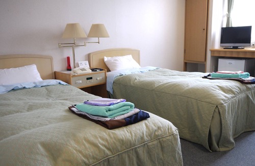 Kawayu Onsen House | Discover KKR Kawayu: Family-Friendly with Hot Tub Access