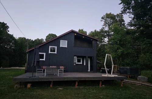 Idena House | Experience KLĀNU MĀJA: Oceanfront Haven with Pool & Hot Tub