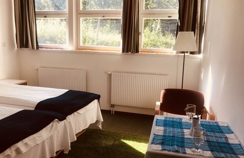 Norberg Hotel | Discover Klackbergsgården: Family-Friendly Retreat with Dining