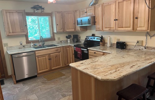 Klickitat House | Experience Klickitat River's Edge Retreat: Pet Friendly Getaway