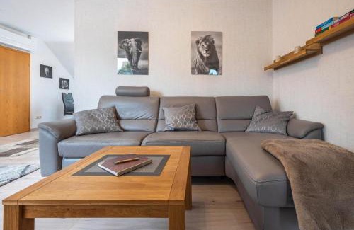 Loehne Apartment | Comfortable Kastanie Apartment with Ocean Views & Balcony
