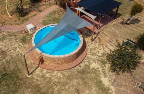 Hammanskraal Apartment | Guest Favorite: Klipdrift Sands Bush Camp with Pool Access