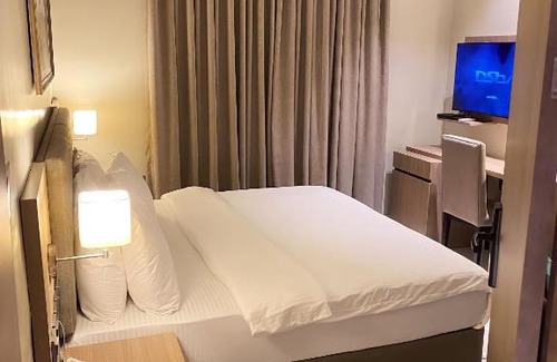 Maitama Hotel | Explore Knightsbridge Hotel and Suites: Pet-Friendly Retreat