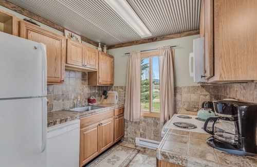 Clark Cabin | Idyllic Knotty Pine Cabin with Pool and Scenic Views