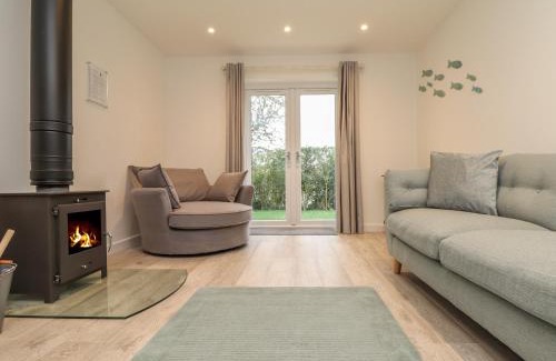 Mullion House | Elegant Kober House: 5-Star Stay with Family & Pet Comfort