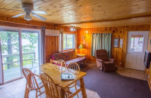 Puposky Cabin | Relax at Kohl's Resort: Top-Rated Pool and Spa Retreat
