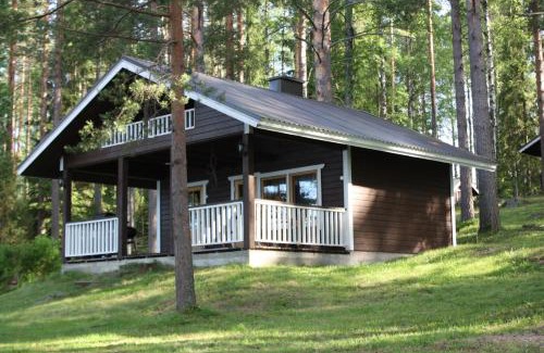 Mikkeli Ski Chalet | Unforgettable Koivurannan Lomamökit Mänty with Oceanfront Views