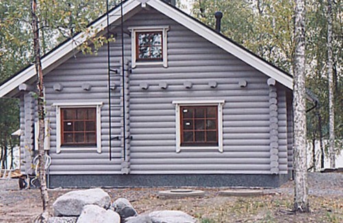 Hankasalmi House | Experience Koivuranta: Scenic Lake Views & Spa Delights