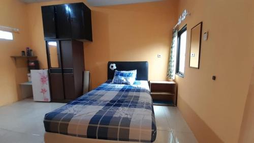 Jakarta House | Top-Rated Kokas Room: Child-Friendly Comfort Awaits