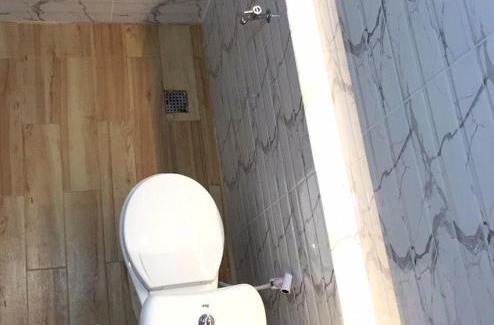 Pamulang House | Charming American-Style Wooden House in Kos
