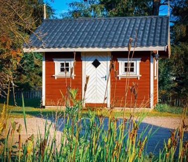 Skien House | Cozy Cabin by the River with Ocean View and Pet Friendly