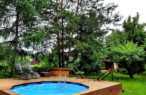 gmina Goscieradow Cabin | Pet-Friendly Kosiedlisko: Family Fun with Pool Access