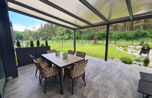 Palanga House | Relax at Kotedžas Nemirsetos Parke with Ocean Views