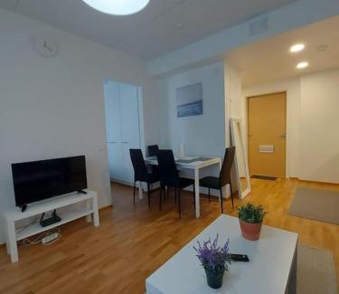 Lantinen District Apartment | Modern Kotimaailma Apartment with Family-Friendly Amenities