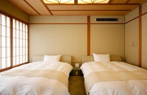 Konpira Onsen Hotel | Relax at Kotohira Onsen Kotosankaku with Hot Tub & Kitchen