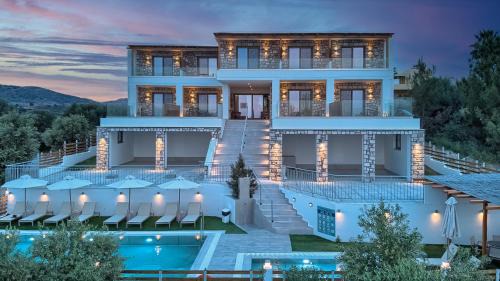 Haraki Hotel | Discover KOUROS STONE SUITES: Oceanfront Bliss Awaiting