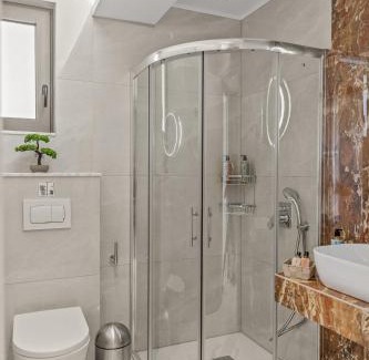 Haraki Hotel | Discover KOUROS STONE SUITES: Oceanfront Bliss Awaiting