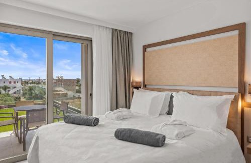 Haraki Hotel | Discover KOUROS STONE SUITES: Oceanfront Bliss Awaiting