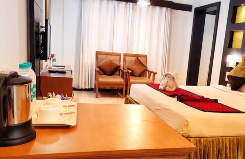 Kozhikode Hotel | Top-Rated Kovilakam Residency: Family-Friendly Amenities