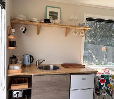 Otaki Beach House | Top-Rated Kowhai Landing Beach Cabin with Hot Tub Access