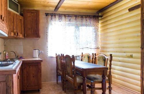 Skhidnytsya House | Budget-Friendly Kozatsky Dvorik with Kitchen Amenities