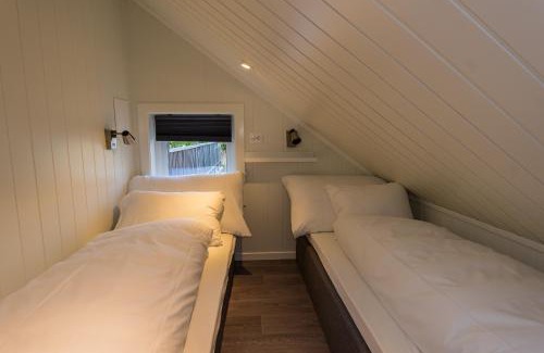 Arendal Hotel | Experience Ocean Views at Krøgeneslåven Microtel