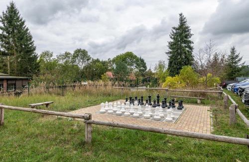 Feldberger Seenlandschaft Resort | Discover Krüseliner Mühle Bungalows with Family-Friendly Pool