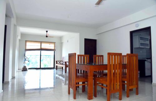 Thalassery Apartment | Discover Krishna Dhwani Apartments with Private Pools