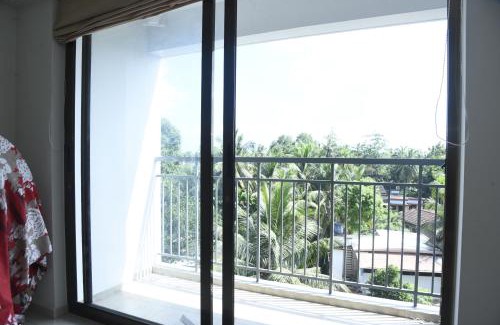Thalassery Apartment | Discover Krishna Dhwani Apartments with Private Pools