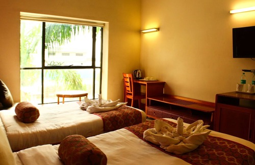 Rajkot Hotel | Discover Comfort at Krishna Park Resort with Pool & Spa