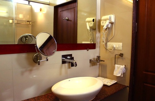 Rajkot Hotel | Discover Comfort at Krishna Park Resort with Pool & Spa
