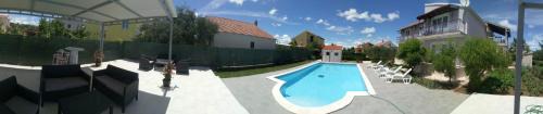 Gradina House | Discover KrkaHaus: Family-Friendly Hotel with Pool Access