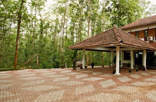 Nilambur Hotel | Discover KTDC Tamarind: Family-Friendly Stays in Nilambur