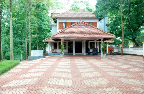 Nilambur Hotel | Discover KTDC Tamarind: Family-Friendly Stays in Nilambur