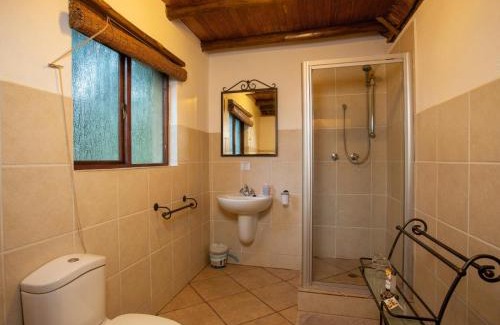 Thorny Bush Game Reserve Cabin | Relax at Kubu Safari Lodge: Oceanfront Haven with Spa