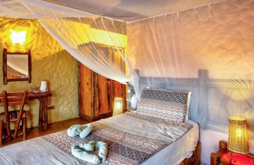 Thorny Bush Game Reserve Cabin | Relax at Kubu Safari Lodge: Oceanfront Haven with Spa