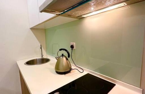 Batu Lintang Apartment | Relaxing Kuching Kozi Square Apartment with Oceanfront Pool