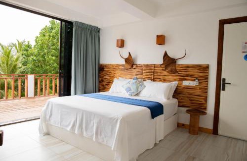 Thulusdhoo Island House | Idyllic Kudhi Boli Beach House with Oceanfront Views