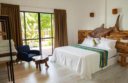 Thulusdhoo Island House | Idyllic Kudhi Boli Beach House with Oceanfront Views