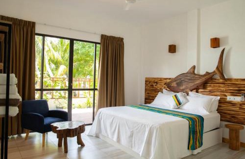 Thulusdhoo Island House | Idyllic Kudhi Boli Beach House with Oceanfront Views