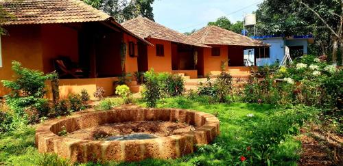 Hosdurg House | Pet-Friendly Kudil Mud Cottages with Breakfast in Cheemeni