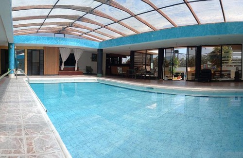 Sangolqui House | Discover KUFA House: Family-Friendly with Pool & Hot Tub