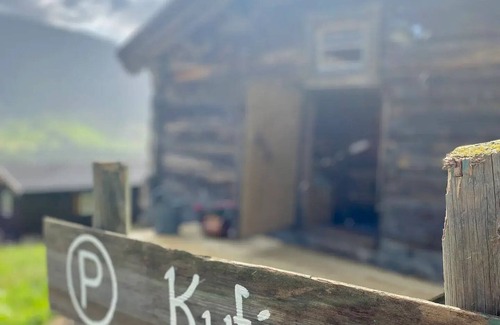 Skjaak House | Discover Kufjøset: Renovated 1830 Barn with Family-Friendly Perks