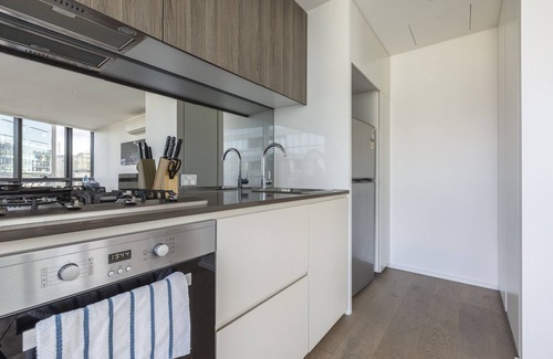 Docklands Apartment | Discover Kula Docklands: Family-Friendly with Pool Access