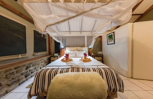 Ruacana Cabin | Guest Rated 9/10 - Kunene River Lodge with Pool & Restaurant